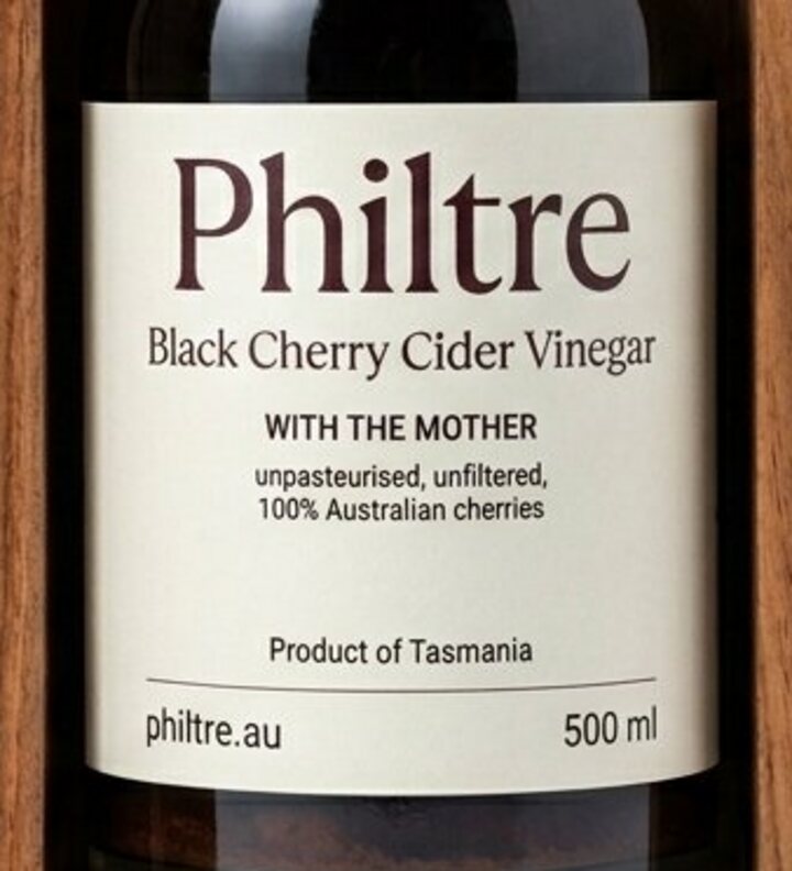 The Philtre label in close-up: Black Cherry Cider Vinegar, with the mother, unpasteurised, unfiltered, 100% Australian cherries, Product of Tasmania, 500 ml.